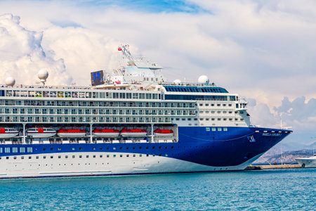 Corfu, GREECE, August 2022. Big cruise ship Marella Explorer 2 the newest ship in the fleet of Marella Cruises, British cruise line operated by TUI UK docked at the cruise terminal of the Kerkyra.のeditorial素材