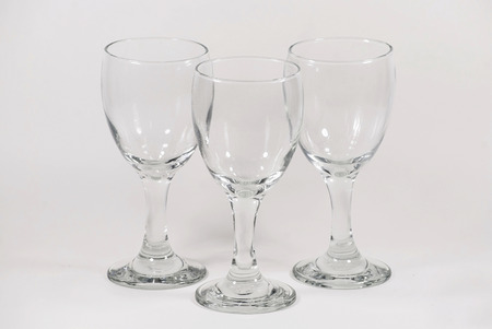 Empty wine glass. isolated on a white backgroundの写真素材