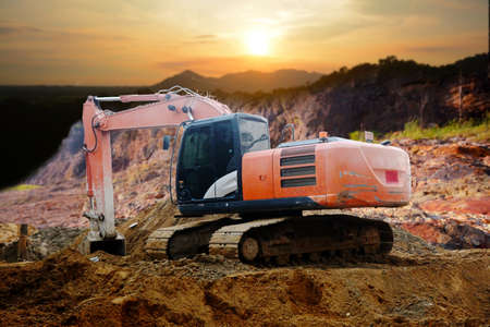 construction site digger, excavator and dumper truck. industrial machinery on building siteの写真素材