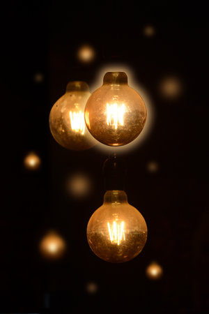light bulb on dark backgroundの写真素材