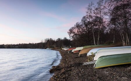 Rowboats on the lakesideの写真素材