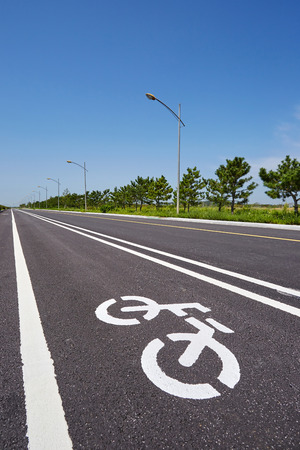The Bicycle road sign scenery was filmed in in-cheon, South Koreaの写真素材