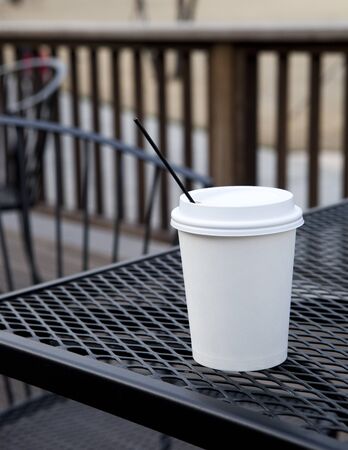 Hot coffee in cup on table background.の写真素材