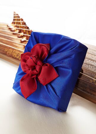 Korean traditional gifts and gayageum. gayageum is a Korean traditional musical instrument.の写真素材