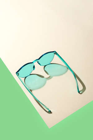 Colorful sunglasses on a table.の写真素材