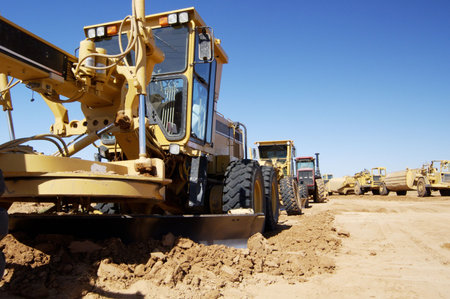 Heavy construction equipment on a construction site.