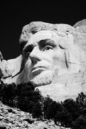 the head of Abraham Lincoln on Mount Rushmore National Memorial in black and whiteのeditorial素材