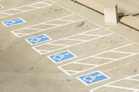 handicap parking spaces in a parking lotの写真素材