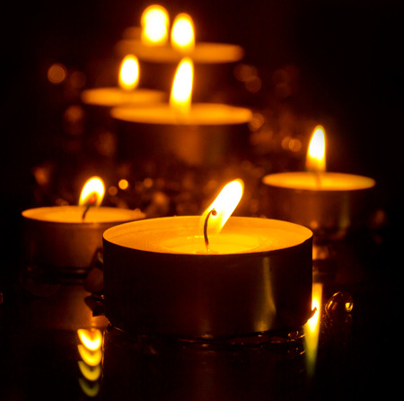 Tea lights in the nightの写真素材