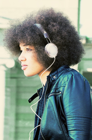 Girl with headphonesの写真素材