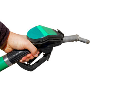 Man holding a fuel nozzle, isolated on white backgroundの写真素材