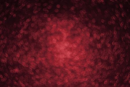 Red swirly bokeh background. Point of light out of focus.の写真素材