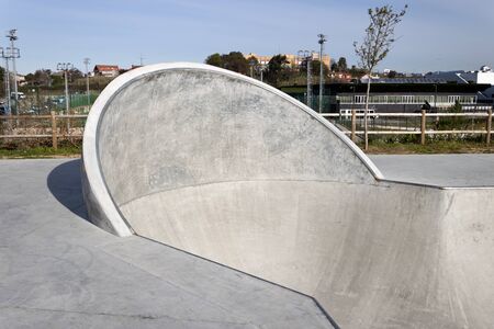 Cradle in a concrete bowl in a skate parkの写真素材