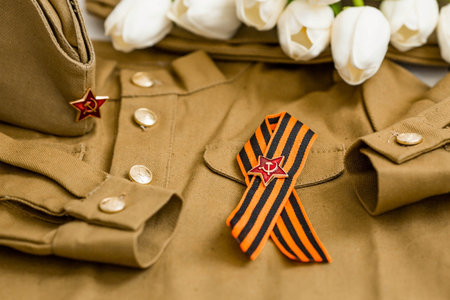Banner. Military uniform and St. George's ribbon with a star. The concept of the Great Victory of...