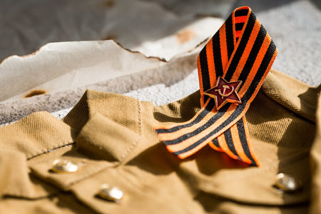 Banner. Military uniform and St. George's ribbon with a star. The concept of the Great Victory of...