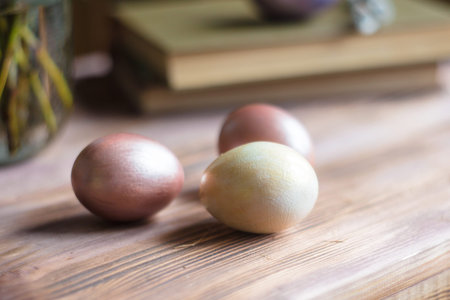 Easter eggs on a wooden background. Selective focus. Holiday.