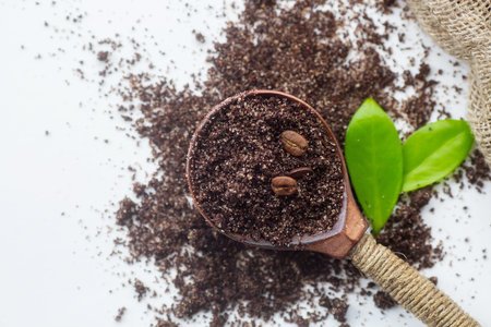spa treatments. Natural, coffee body scrub.Natural body cosmetics on a white background, top view....
