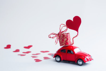 Moscow, Russia - January, 2020: Red retro toy car deliveringの写真素材