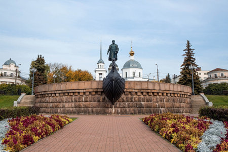 Travel in Russia.Monument to Afanasy Nikitin on the embankment of the same name. In the background is the Church of the Ascension of Christ. Russia, the city of Tver.のeditorial素材
