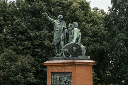 Statue of Kuzma Minin and Dmitry Pozharsky in front of St. Basil Cathedral - Red Square in Moscow.のeditorial素材