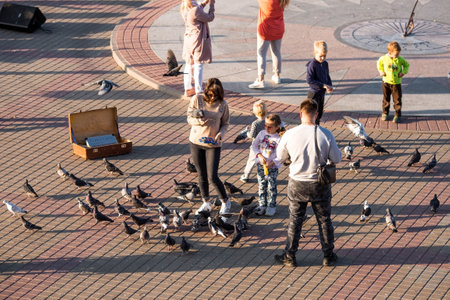 The embankment in Sevastopol in the rays of the setting sun. People are walking around the city. Russia, Republic of Crimea.のeditorial素材