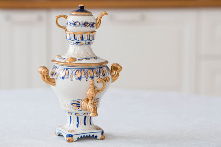 Gzhel samovar with a traditional blue pattern and gilding.の写真素材