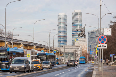 Mosttransauto. City electric buses on the route. View of the monument "Worker and collective farmer". VDNH.のeditorial素材