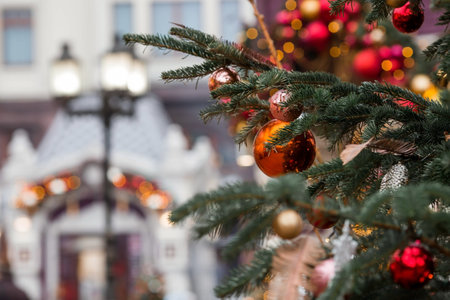 Moscow, Revolution Square. Christmas decoration of the streets. Beautiful decoration festives on the Christmas tree in red and gold traditional colors. New Year's card 2024.の写真素材