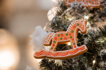 Beautiful decoration festives on the Christmas tree. close-up. Beautiful Christmas background. The concept of decorations and decor for the new year. New Year's card 2024.の写真素材