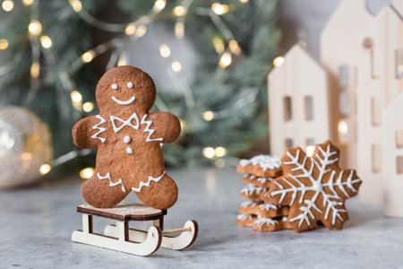 Homemade gingerbread Christmas cookies in icing sugar. Delicious gingerbread cookies on the...