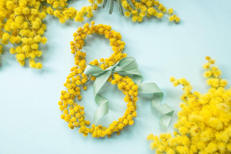 International Women's Day. A banner, a flyer, a beautiful postcard for March 8th. Yellow mimosa...