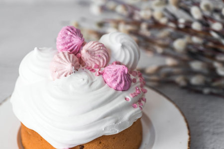 Beautiful still stylish life. Easter cake with meringue, marshmallows, Easter eggs and willow twigs...