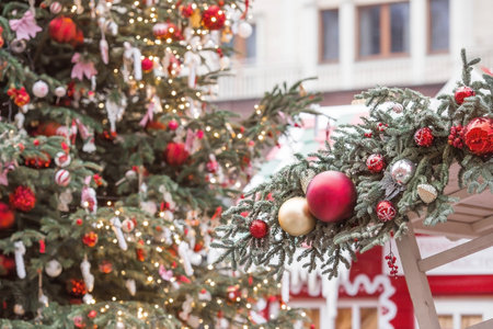 Beautiful festive decorations on the Christmas tree. Close-up. Beautiful Christmas background. The concept of decorations and decor for the new year. New Year's Card 2025の写真素材