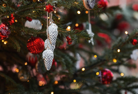Beautiful festive decorations on the Christmas tree. Close-up. Beautiful Christmas background. The...