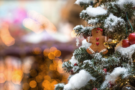 Beautiful festive decorations on the Christmas tree. Close-up. Beautiful Christmas background. The concept of decorations and decor for the new year. New Year's Card 2025の写真素材