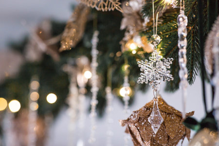 A banner or a beautiful background. Stylish Christmas tree toys in the interior of the house. Green tones. The concept of a stylish new year and Christmas 2025の写真素材