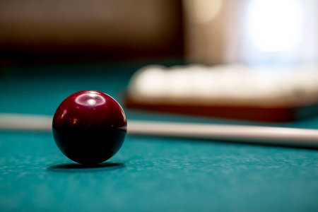 Russian billiards. Red and white balls are lying on a green billiard table. Spending time at home playing a hobby sports game.の写真素材
