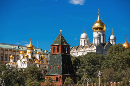 Moscow on a sunny day. The Grand Kremlin Palace, the Annunciation Cathedral, the Archangel Cathedral and the Kremlin towers on the embankment. The business card of Moscow.の写真素材