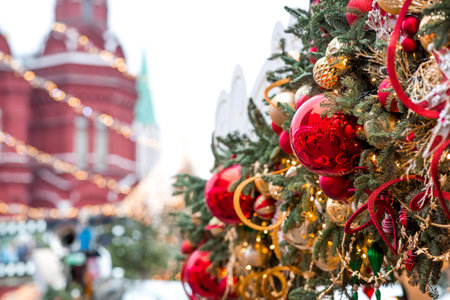 Festive toys on the Christmas tree in Moscow. Beautiful Christmas background. The concept of preparing and decorating for the new year. New Year's card 2026.の写真素材