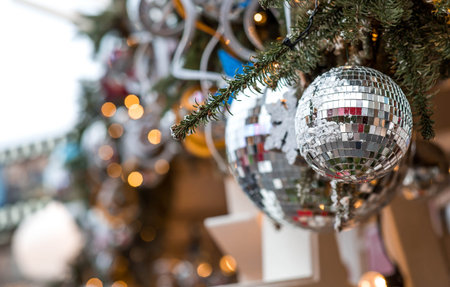 Festive toys on the Christmas tree on the streets of Moscow. New Year's card 2026. Beautiful...