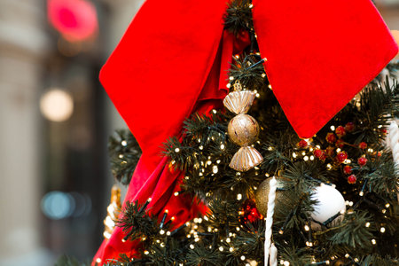 New Year's card 2026. Beautiful Christmas background. Festive toys on the Christmas tree in Moscow. The concept of preparing decorations and decorations for the new year.の写真素材