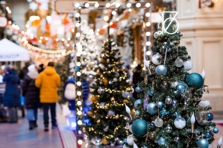 Magical Christmas background. Concept of preparation and decoration for the New Year. Holiday toys on the New Year's tree in Moscow. New Year's card 2026.の写真素材