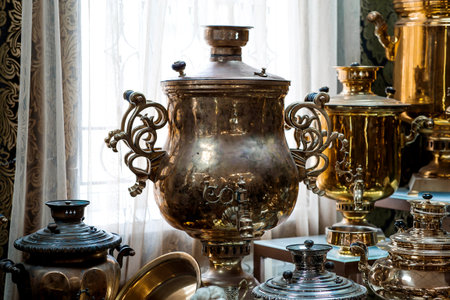 Russian traditions. Ancient, beautiful samovars in the Samovar Museum. Tourist museum house and souvenir shop. Russia, city of Kolomna.の写真素材