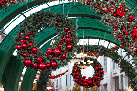 Concept of preparation for Christmas and New Year 2026. Christmas wreath. Christmas decorations in the interior.