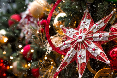 Red, festive toys on the New Year's tree in Moscow. Magical Christmas background. Concept of...