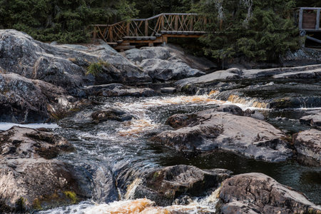 Akhinkoski Waterfalls or Ruskeala Waterfalls on the Tohmajoki River. Russia, Republic of Karelia