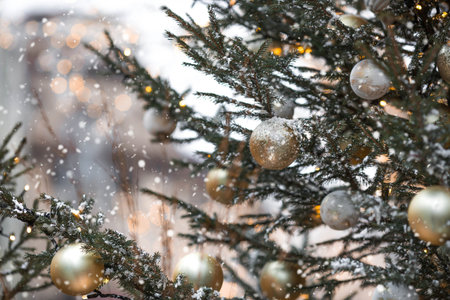 Holiday Christmas tree decorations on a Christmas tree in Moscow. New Year's postcard 2026. Magical Christmas background.の写真素材