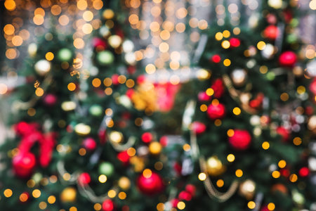 Beautiful Christmas background 2026. Abstract blurred Christmas background with warm-colored...