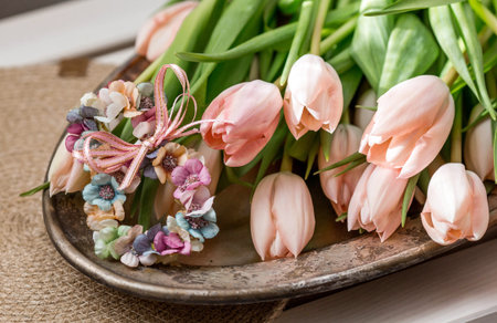 The concept is timed to the arrival of spring and International Women's Day on March 8. A bouquet of spring, delicate tulips and the number 8 in close-up.の写真素材