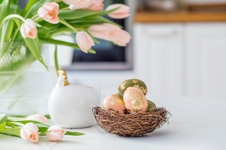 Beautiful Easter greeting card. A bouquet of delicate tulips, a chicken, and eggs with a golden...